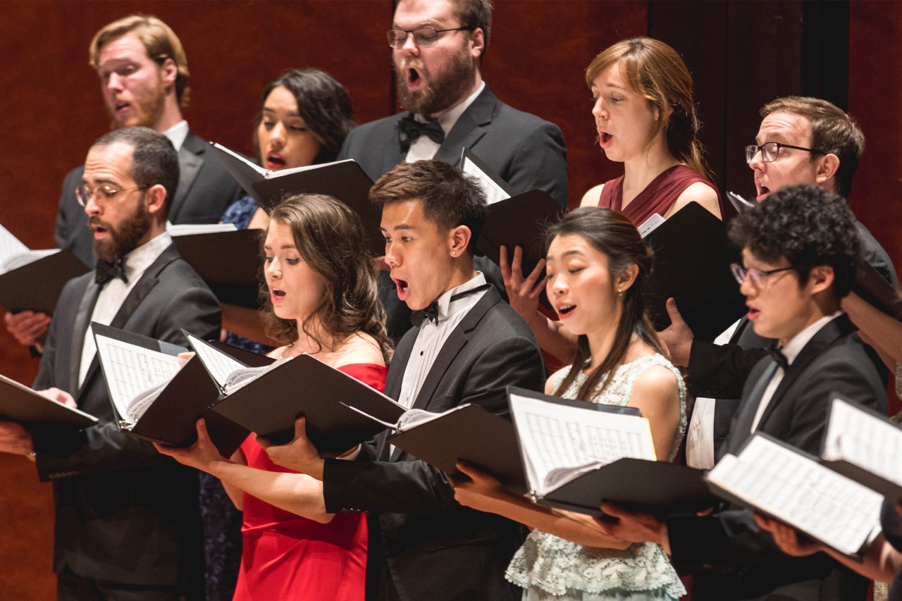 CCM Choral performers sing on the Robert J. Werner Recital Hall stage