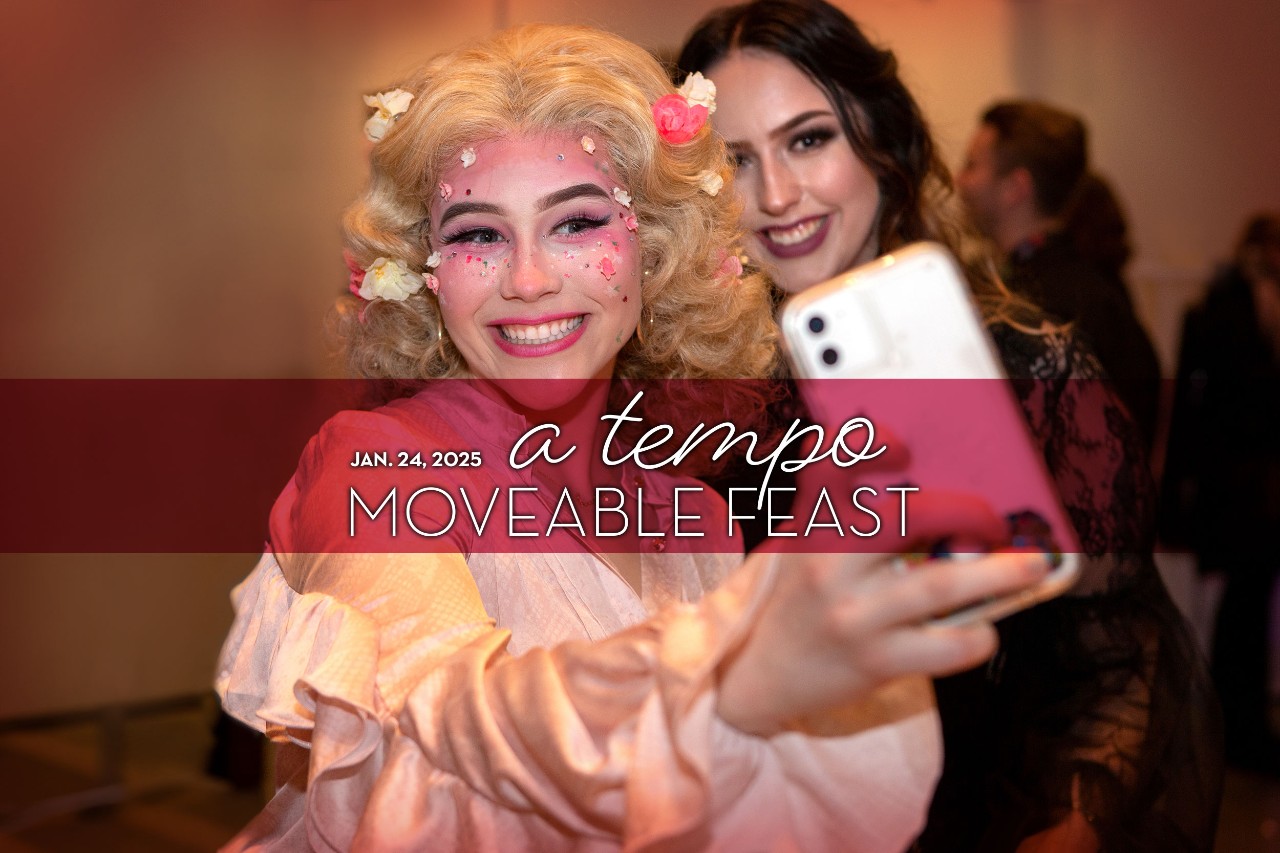 Two female CCM students pose for a selfie at the Moveable Feast event.